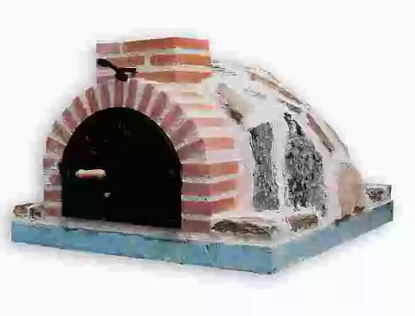 Horno de piedra de musgo y ladrillo